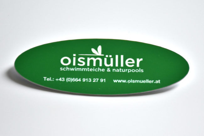 Grüner Anstecker von Oismüller Schwimmteiche