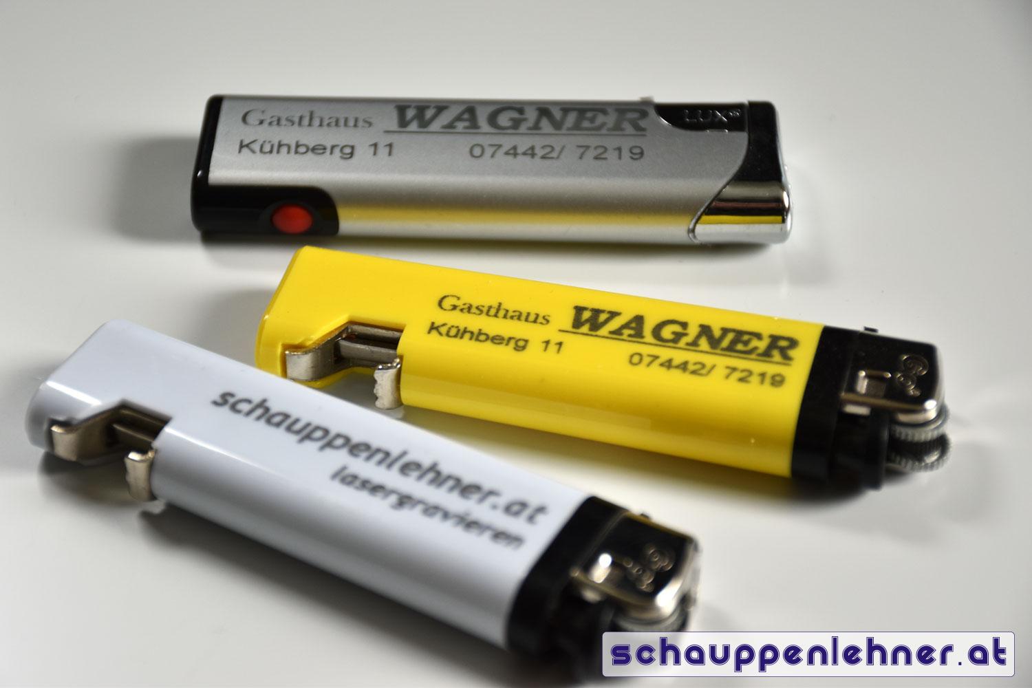 Gravierte Feuerzeuge mit Logo und Kontaktdaten für das Gasthaus Wagner